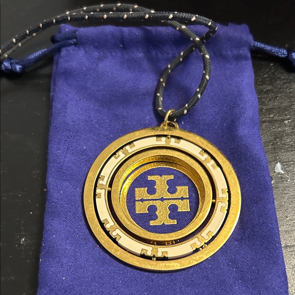 Tory Burch Navy and Gold Spinner Pendant Necklace, 24” - Picture 5 of 7
